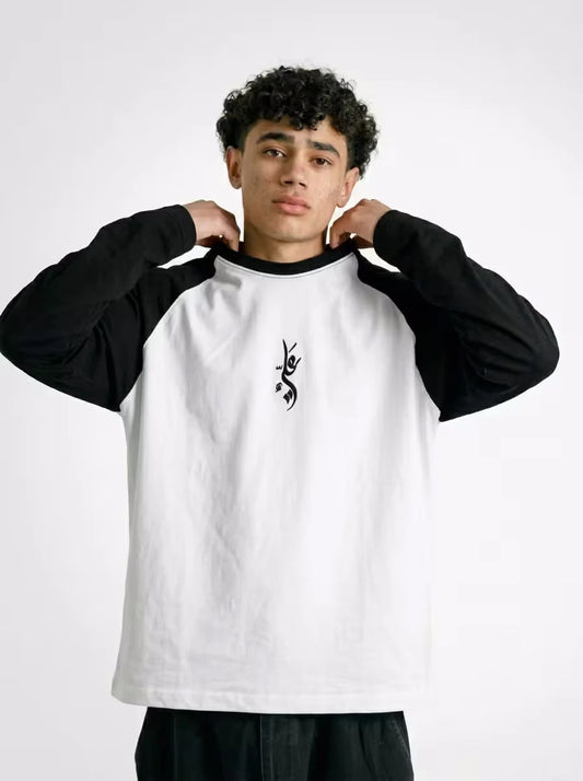 Minimal Islamic streetwear raglan featuring Arabic Ali embroidery