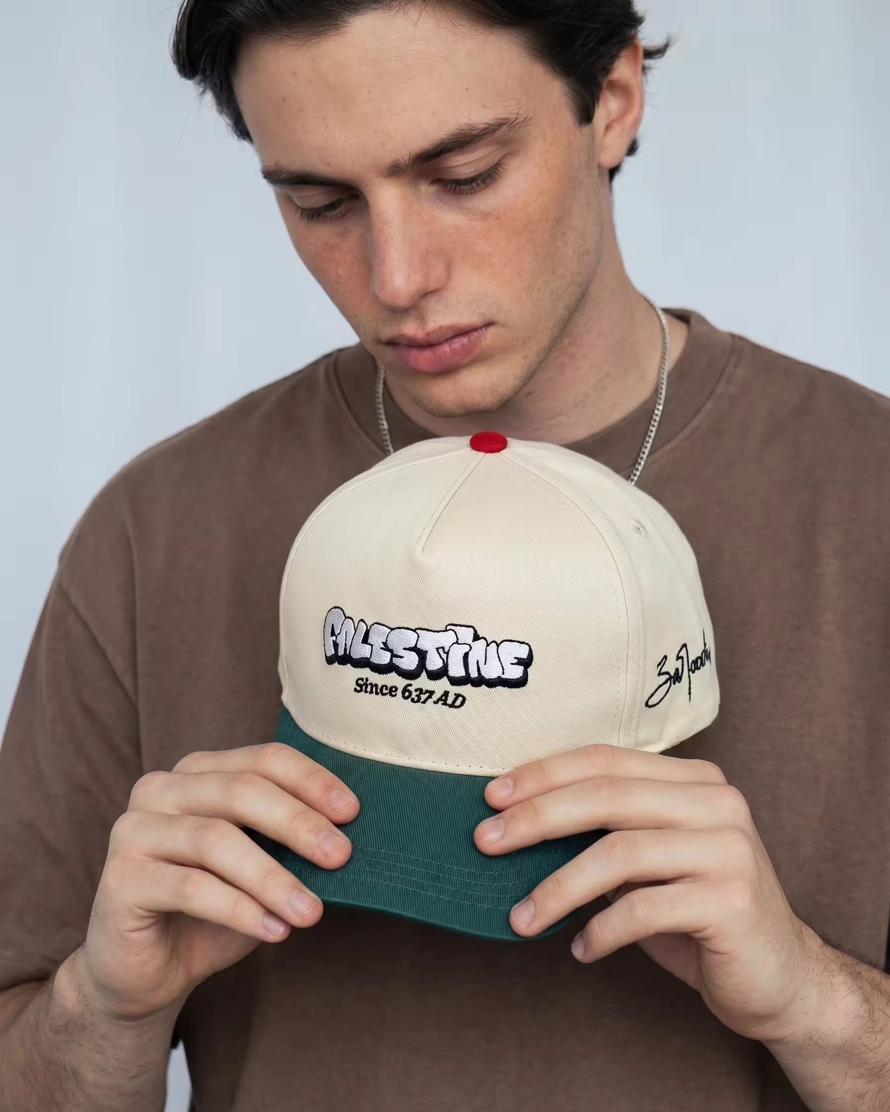 Man wearing Palestine Since 637 AD cap - Identity Streetwear