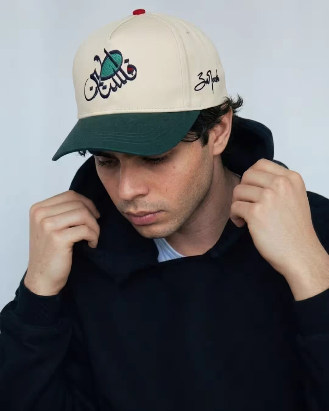 Man wearing Palestine flag colorway cap - Identity Streetwear